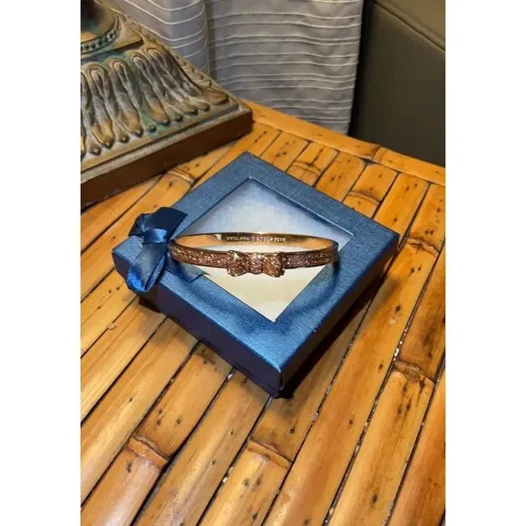 Kate Spade New York Gold Tone Glitter Bow Bangle Bracelet Round Hinged Cuff - Picture 7 of 11